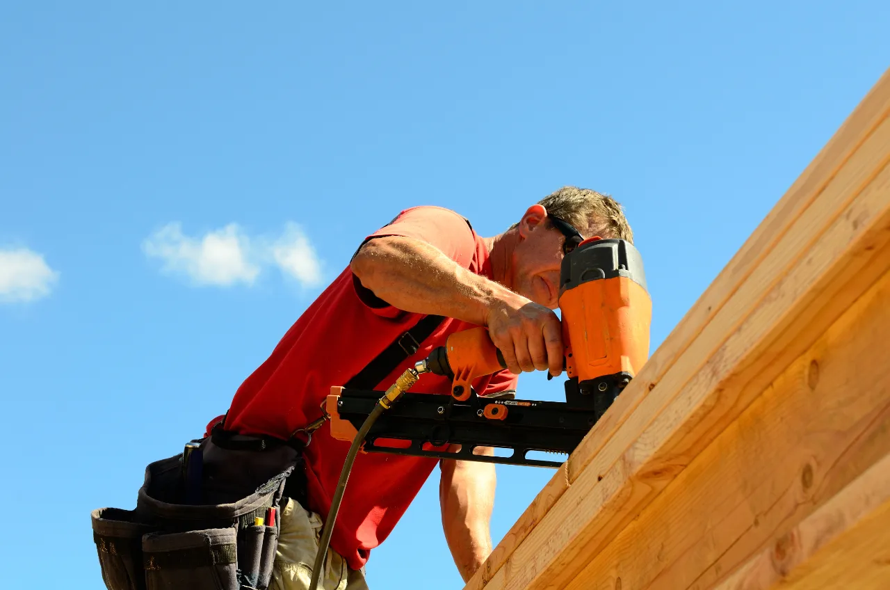 Installing trim with a nail gun in Bridgeport, CT