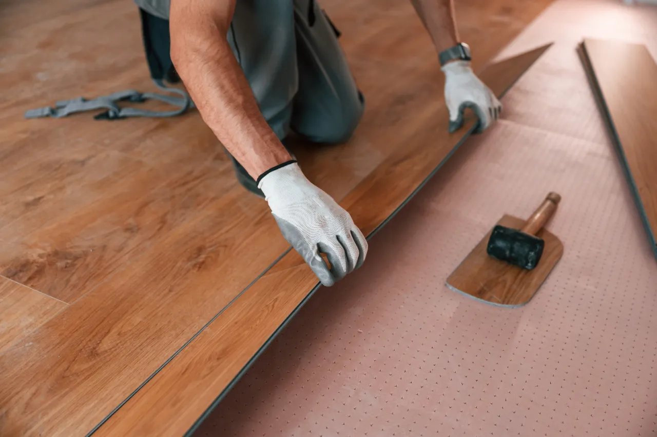 Close up of new luxury vinyl planks being installed
